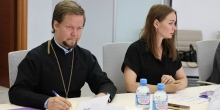 Священнослужитель на заседании Штаба по наблюдению за выборами